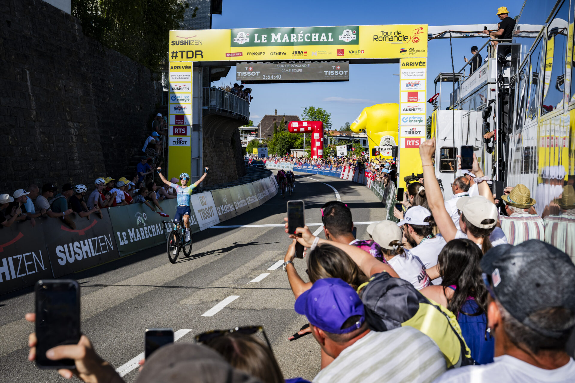 KEYPIX - Lorenzo Fortunato from Italy of team XDS Astana raises his arms after crossing the finish line to win the second stage, a 157 km race between La Grande Beroche and La Grande Beroche at the 78th Tour de Romandie UCI World Tour Cycling race, in La Grande Beroche, Switzerland, Thursday, May 1, 2025. (KEYSTONE/Jean-Christophe Bott)