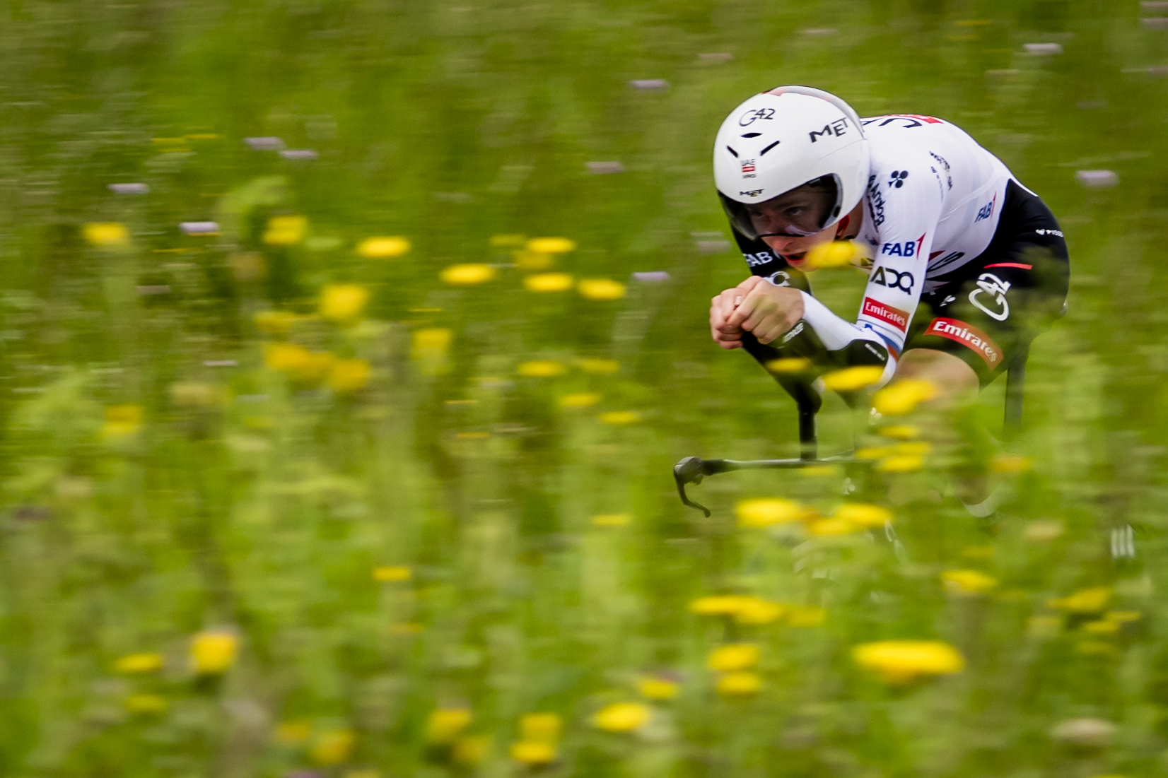 Tadej Pogacar from Slovenia of UAE Team Emirates XRG in action during the prologue, a 3,2 km race against the clock at the 79th Tour de Romandie UCI World Tour Cycling race, in Villars-sur-Glane, Switzerland, Tuesday, April 28, 2026. (KEYSTONE/Jean-Christophe Bott)
