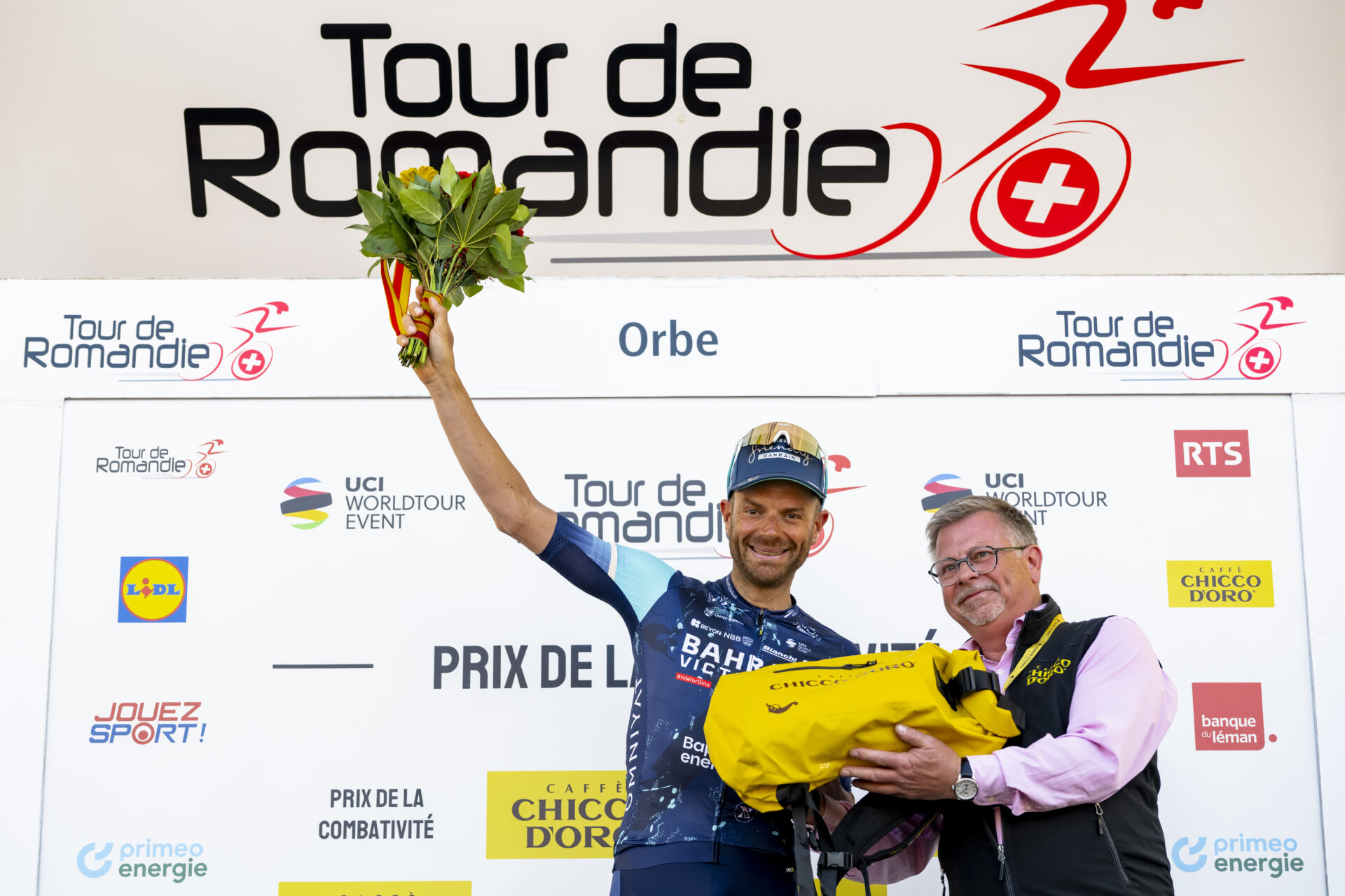 Damiano Caruso from Italy of team Bahrain Victorious celebrates on the podium during the third stage, a 176,6 km race around Orbe at the 79th Tour de Romandie UCI World Tour Cycling race, in Orbe, Switzerland, Friday, May 1, 2026. (KEYSTONE/Jean-Christophe Bott)