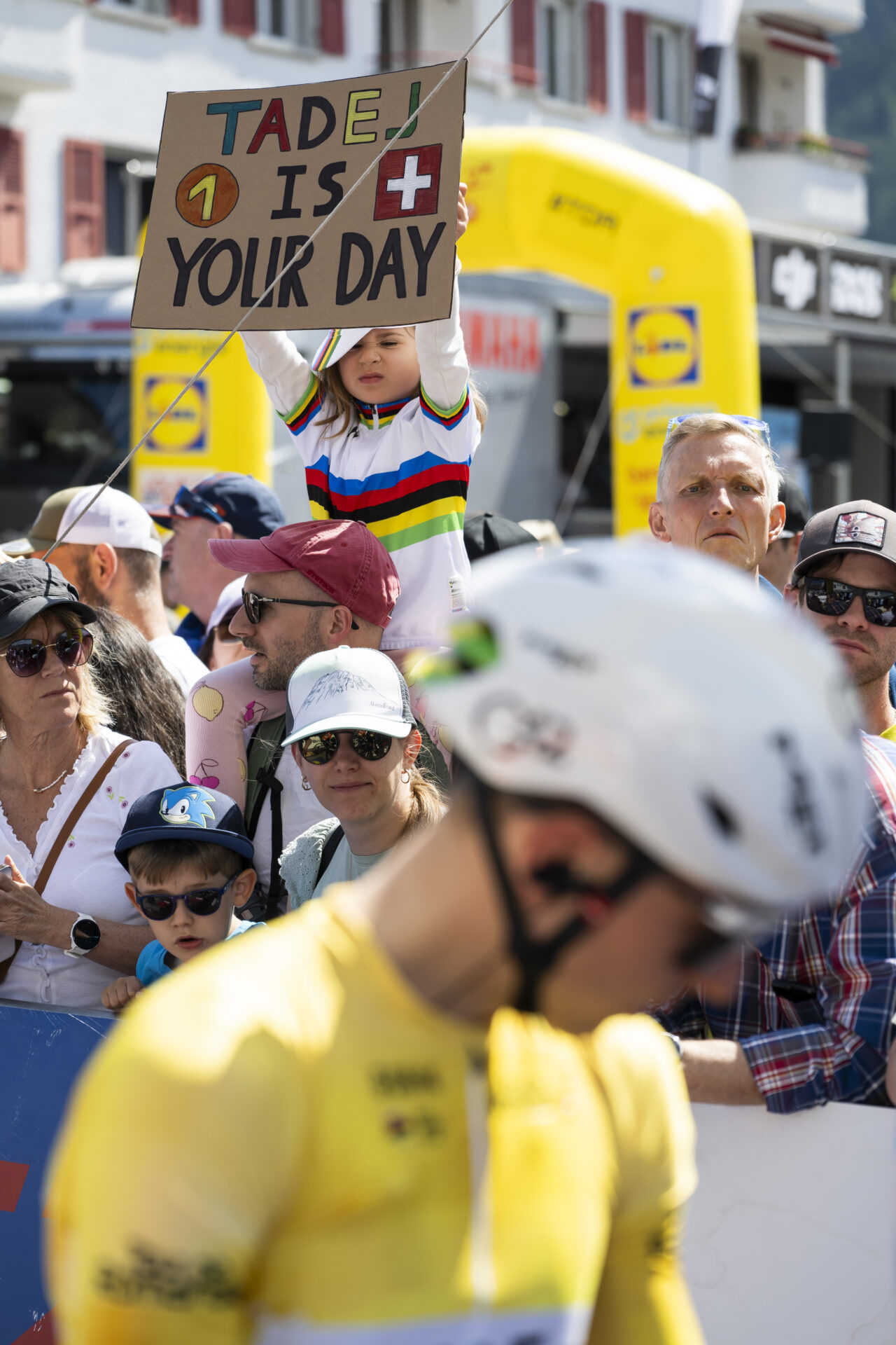 Tadej Pogacar from Slovenia of UAE Team Emirates XRG and supporters in the starting area in Broc during the fourth stage, a 149,6 km race between Broc and Charmey at the 79th Tour de Romandie UCI World Tour Cycling race, in Charmey, Switzerland, Saturday, May 2, 2026. (KEYSTONE/Jean-Christophe Bott)