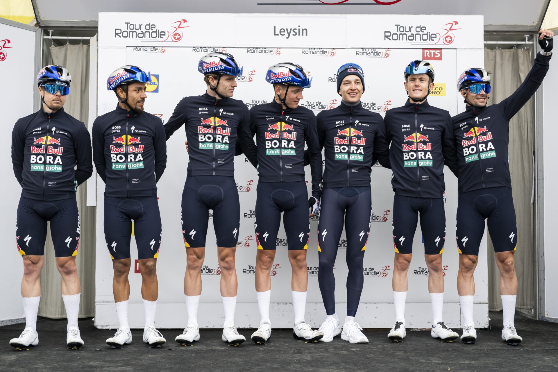 Team Red Bull BORA hansgrohe celebrates on the podium during the fifth and last stage, a 178,2 km race between Lucens and Leysin at the 79th Tour de Romandie UCI World Tour Cycling race, in Leysin, Switzerland, Sunday, May 3, 2026. (KEYSTONE/Jean-Christophe Bott)